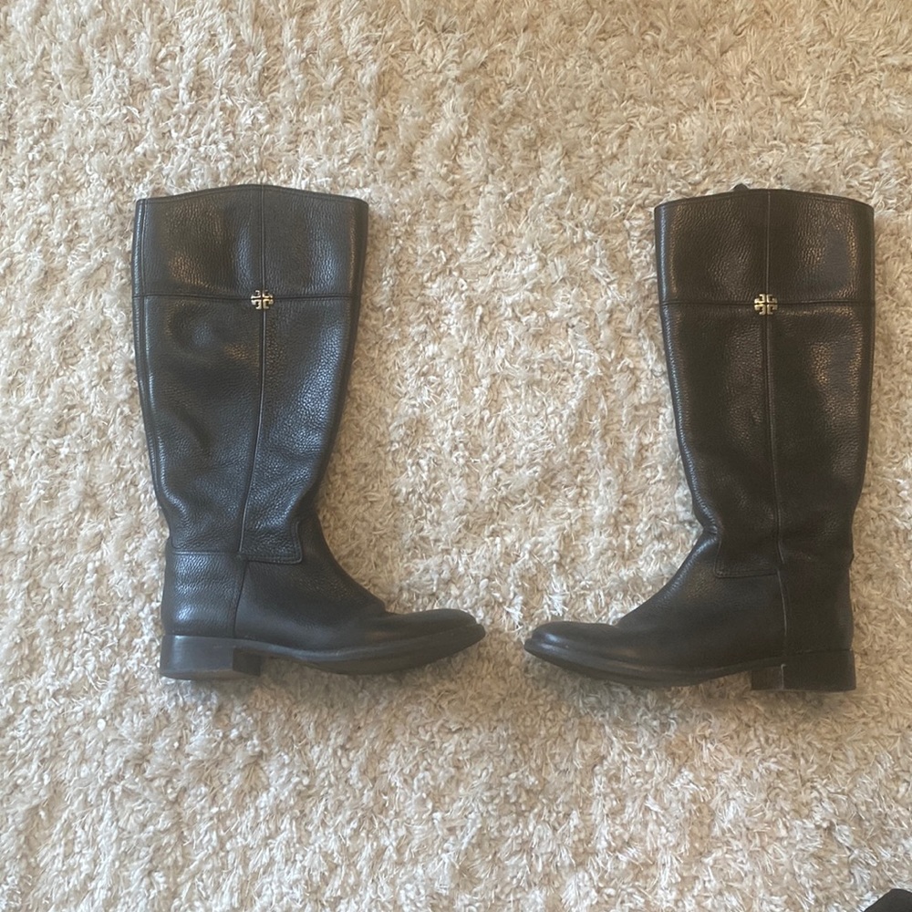 Tall black riding boots